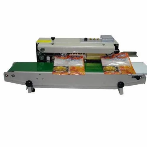 Horizontal continuous band sealer with conveyor