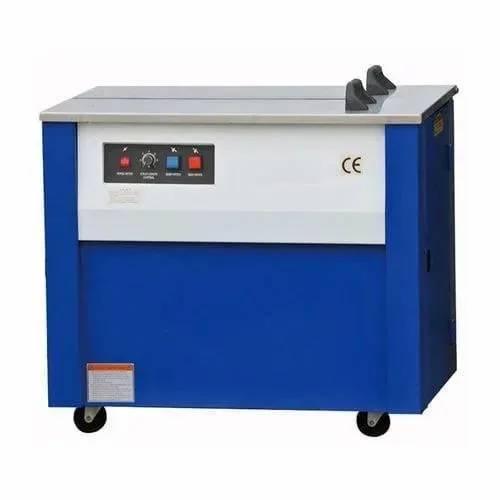 Box strapping machine for packaging operations